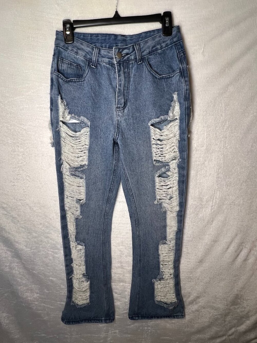 unbranded Sz M heavily distressed flare leg jeans